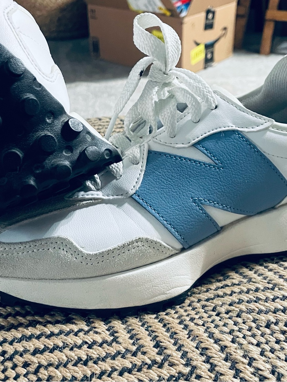 New Balance White and Light Blue Sneaker Label Detail